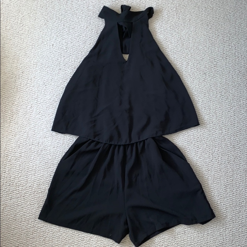 A black fitted waist romper!